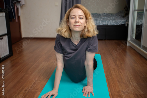 Yoga practice, woman at home, exercise session, mindful training