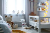A baby room with a crib , chair , and teddy bear