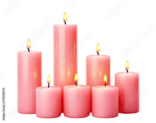 Pink pillar candles with flames illuminated, cut out