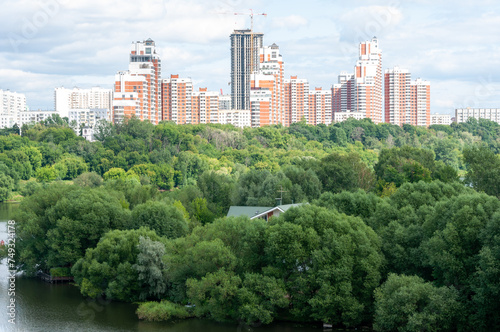 A picturesque view from the bridge over the Moscow River to the river floodplain.