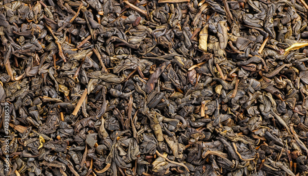 Chinese Pu Ehr dried tea leaves close up full frame as background Chinese Pu Ehr dried tea leaves close up full frame as background