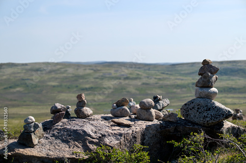 Pyramids of stones in polar tundra. Kola Peninsula, Russia