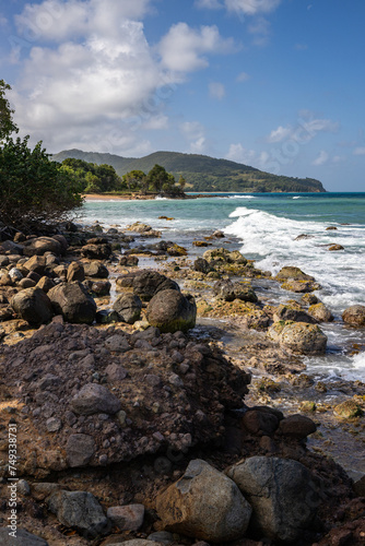 Nature in a special landscape. A rocky coast by the sea. Great landscape shot of cliffs in the Caribbean  the waves breaking against the island of Guadeloupe in the French Antilles.