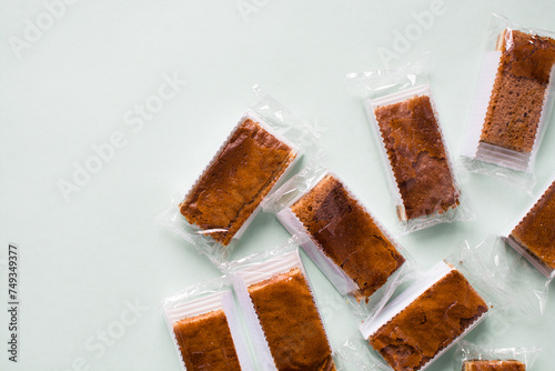 Cakes individually wrapped in plastic packaging, unsustainable product packaging, mini cakes in plastic wrappers wasteful and bad for the environment