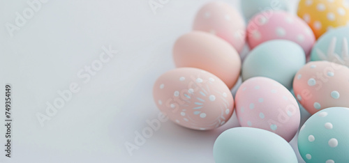 Flat lay with colorful Easter eggs on white background. Holiday concept. Background image for greeting card, spring postcard, banner, flyer, advertising