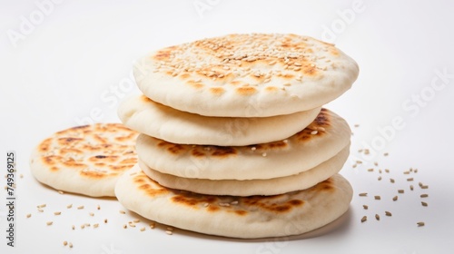 stack of pita bread on white background
