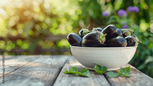 a white bowl of eggplant on a nature background photo