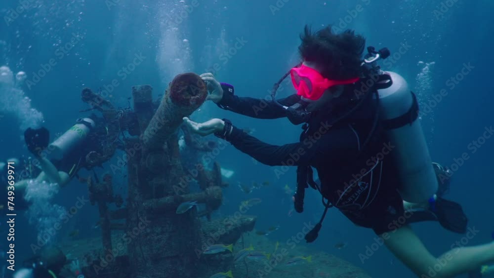 A diver removing placton from an archaeological site A diver removing placton from an archaeological site