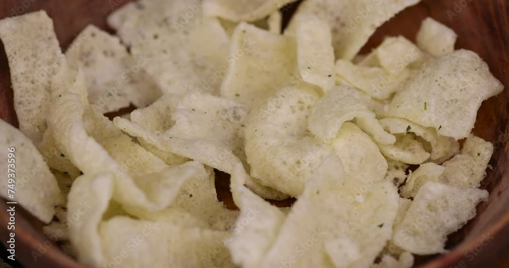 mashed potato chips with spices, crispy potato chips with spices on the table