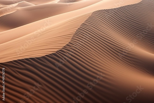 Aerial shot of wind-swept sand dunes  creating wavy patterns