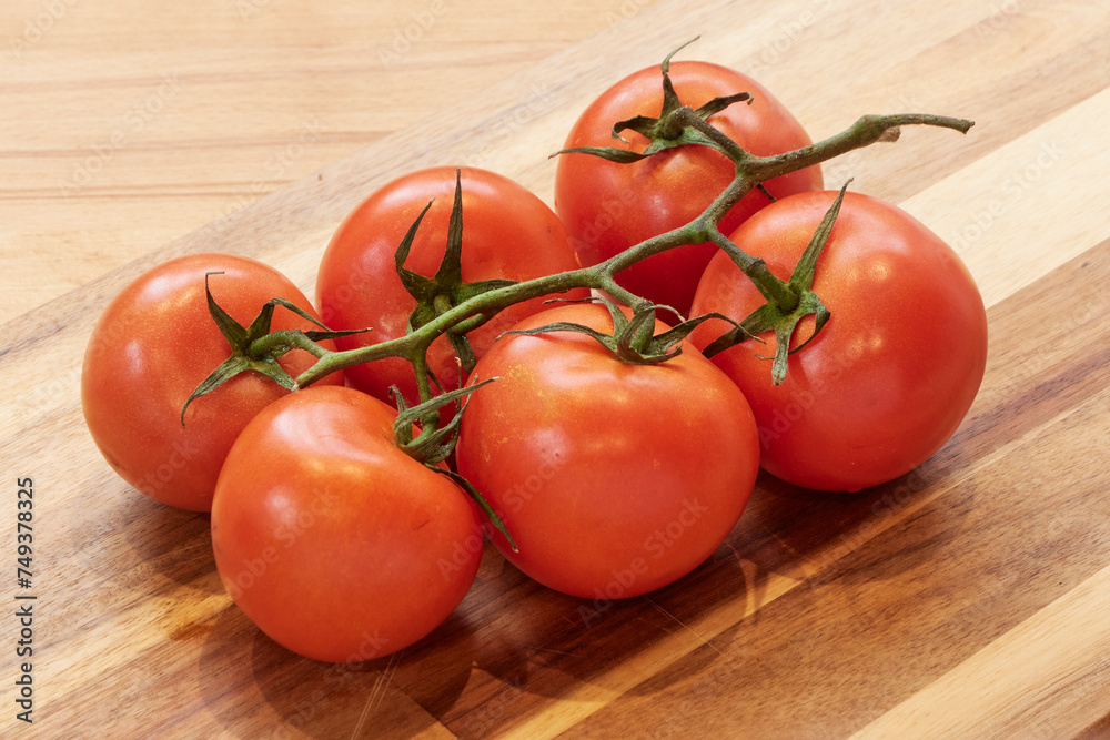 Tomato on branch Tomato on branch