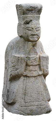A stone statue standing near a tomb in Korea