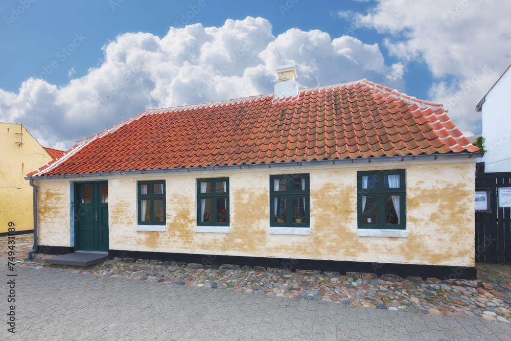 Retro house, home and real estate in countryside with clouds, sky and building on street in Denmark. Vintage architecture, mortgage and Danish residence for lodging, living and old village in Europe