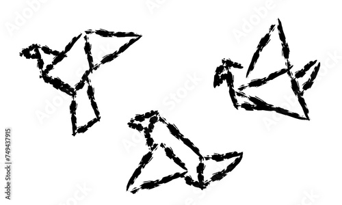 A collection of origami birds flying upwards on a white background.