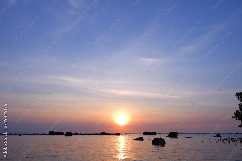 Obraz premium sunset at the sea, beautiful photo digital picture