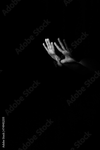 hands in the dark