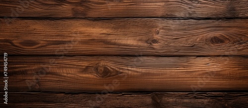 Wallpaper Mural The image showcases a dark brown wood grain pattern on an old, smooth wooden wall. The rustic texture adds character to the background. Torontodigital.ca