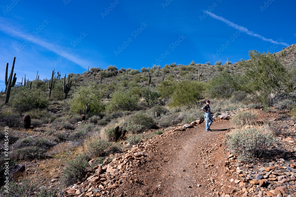A woman hiking in an Arizona trail
