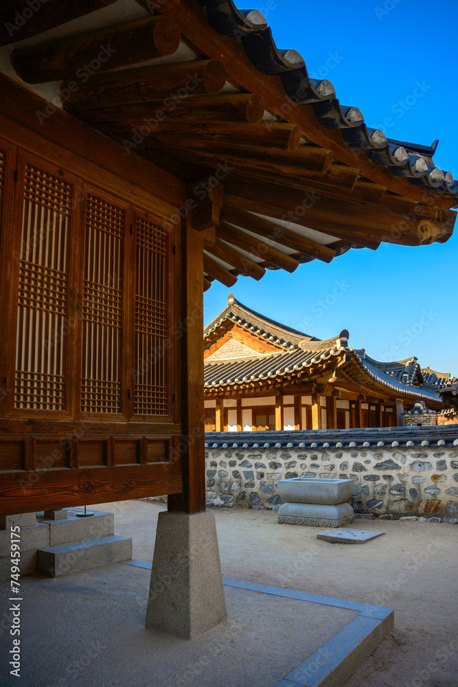 Fototapeta premium Traditional Korean house with walled yard at the folk village park in Seoul, South Korea