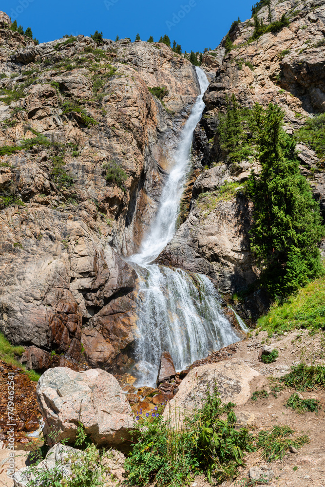 Obraz premium Burkhan-Bulak is the highest (168 meters) waterfall in Kazakhstan, located in the southeast of the country in the Zhetysu region