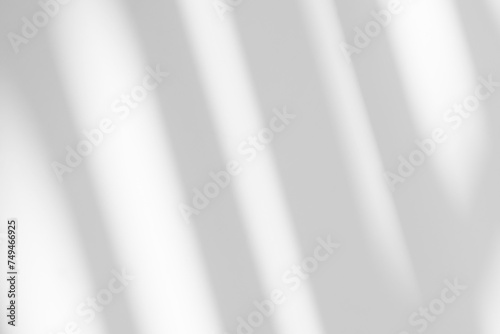Abstract light reflection and grey shadow from window on white wall background. Gray stripe window shadows and sunshine diagonal geometric overlay effect for backdrop and mockup design