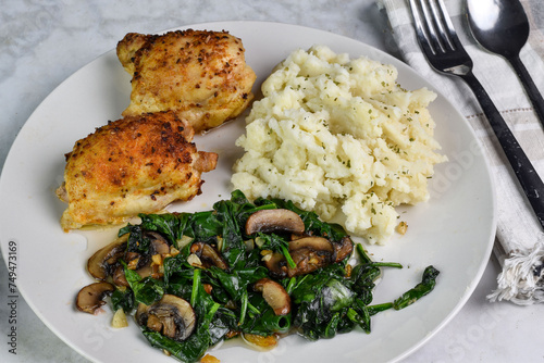 chicken thighs with sauteed spinach and mushrooms