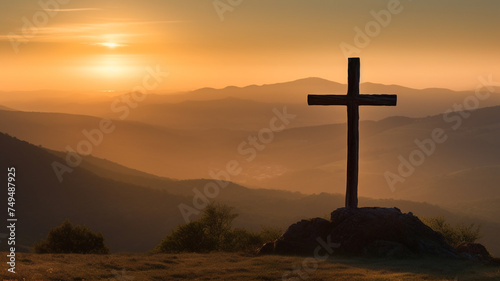 In the early morning light, a cross majestically stands, creating a solemn and peaceful scene.