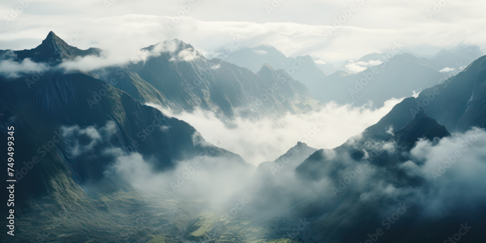 Serene Misty Mountain Escape: A Captivating Landscape of Majestic Peaks, Lush Green Valleys, and Misty Forests, Embraced by a Blue and Cloudy Summer Sky.