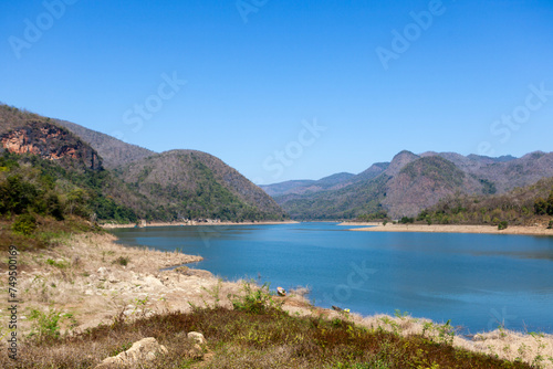 Reservoir and mountain landscape in Mae Ping National Park. Thailand.