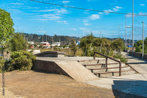 Skate park in Cobquecura, Chile.Consisting on a ladder, rail and a ramp. photo