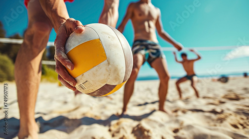 Volleyball player holding ball, close-up of hands and ball. Beach volleyball, summer vacation, active lifestyle photo