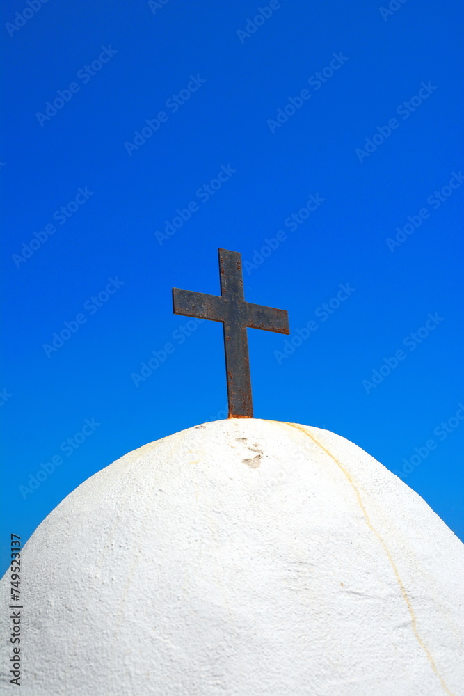 Gorgeous blue and white orthodox small chapel in Greece with clear blue sky. Gorgeous blue and white orthodox small chapel in Greece with clear blue sky.