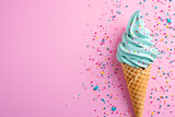 Blue Ice Cream Cone With Sprinkles on Pink Background
