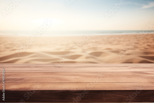 The empty wood table top with a blurred background of a sand beach #749531134