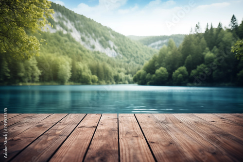 The empty wooden jetty in the foreground with a blurred background of Plitvice lakes