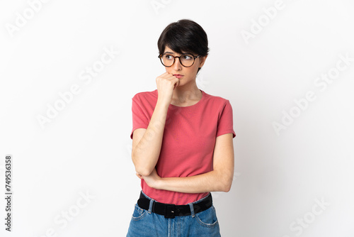 Woman with short hair isolated on white background having doubts