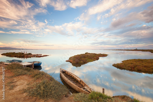 Fishing boats in a natural harbor in Fangar bay, Ebro Delta, Tarragona