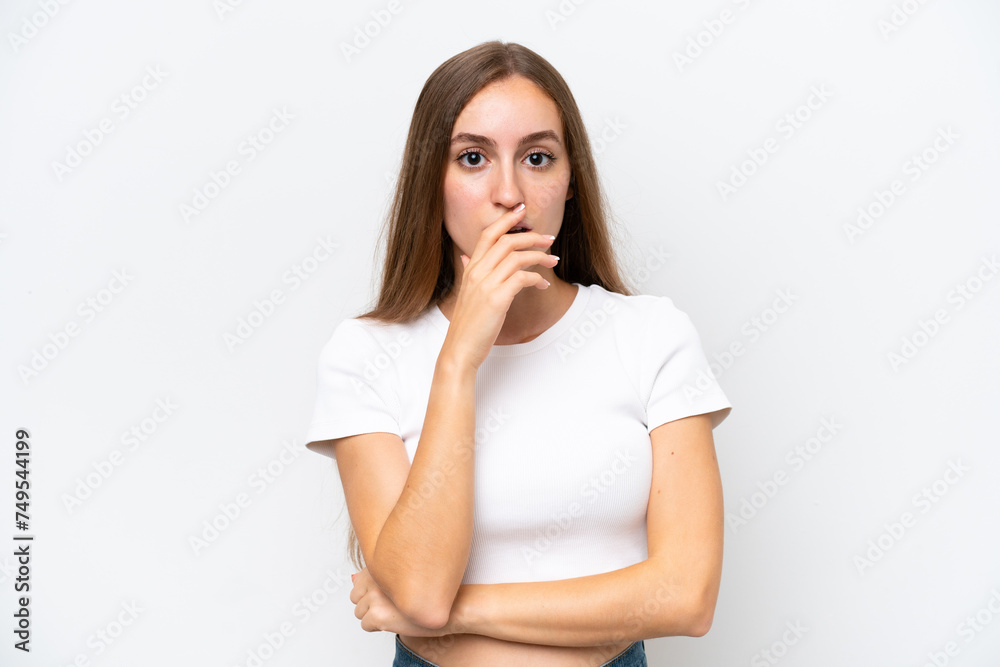 Young caucasian woman isolated on white background surprised and shocked while looking right Young caucasian woman isolated on white background surprised and shocked while looking right