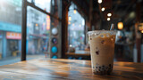Iced bubble tea on wooden cafe table