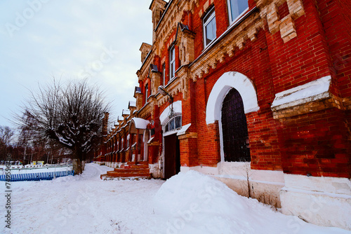 brick building of the old stud farm in winter © Светлана Беляева
