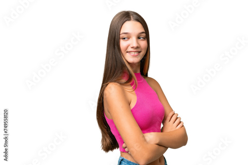 Teenager caucasian girl over isolated background looking to the side and smiling
