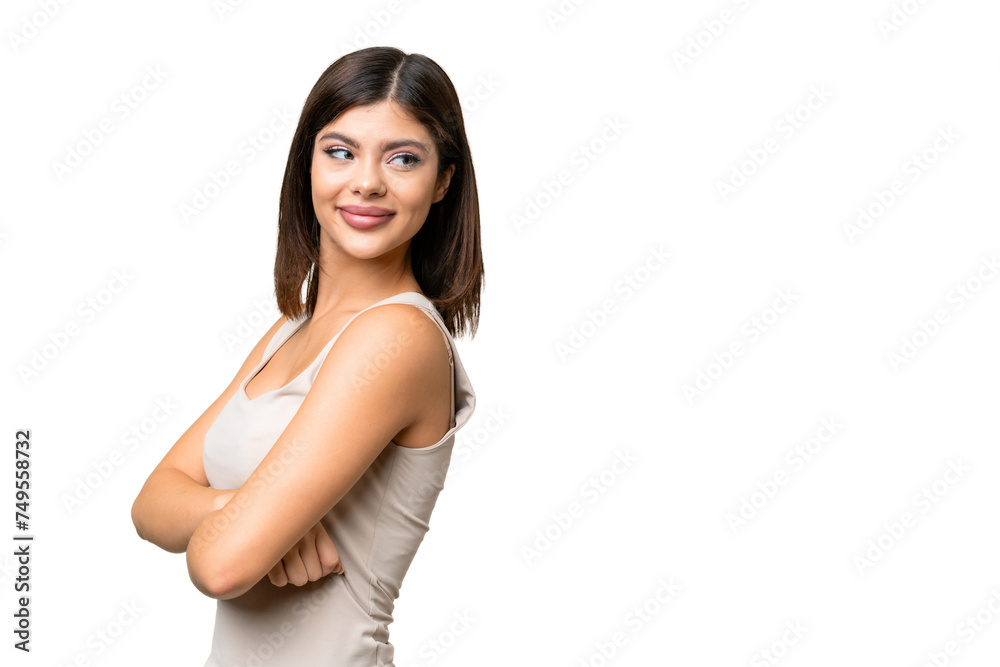 Young Russian woman over isolated chroma key background with arms crossed and happy Young Russian woman over isolated chroma key background with arms crossed and happy