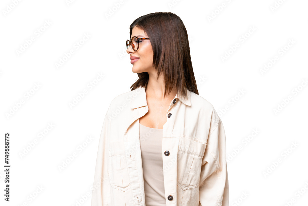 Young Russian woman over isolated chroma key background looking side Young Russian woman over isolated chroma key background looking side