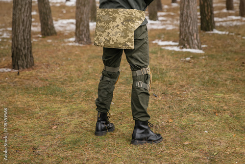 Tactical protection in camouflage color for the convenience and comfort of soldiers. Special military clothing accessories