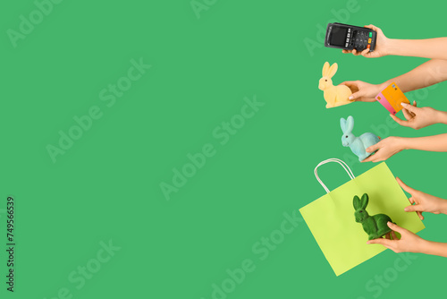 Women with payment terminal...