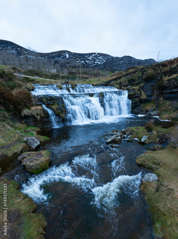 Guarguero waterfalls in winter around the port of Estacas de Trueba. Aerial view from a drone. Espinosa de los Monteros. Pasiegos Valleys. Burgos. Castile and Leon. Spain. Europe