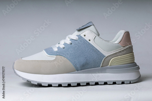 Light women's sneakers on a white background