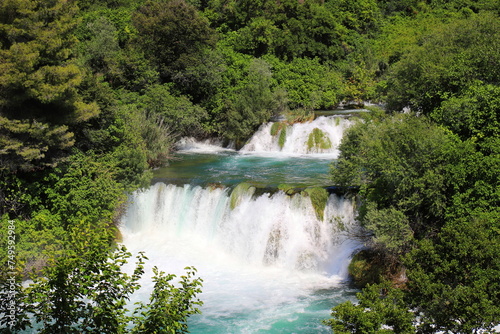 cascade waterfall among large stones in Krka Landscape Park  Cro