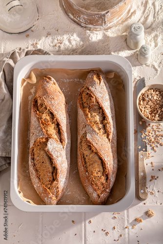 Tasty baguettes baked with flour and yeast.