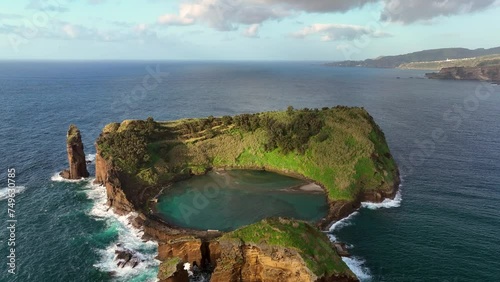 4k Aerial shot of Vila Franca do Campo volcanic island in atlantic ocean, San Miguel, Azores, Portugal. footage Drone flying over volcanic islet photo